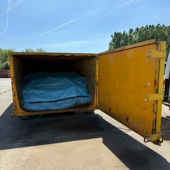 Safe collection of asbestos inside a skip